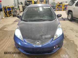 2009 Honda Fit with VIN JHMGE88229S044859, listed as a Copart auction lot 52742495 with 398,726 mi miles and Salvage Title. Bid and sale history available at carsss.com. Image 5.