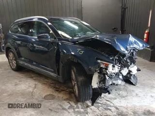 2020 Mazda CX-9 Grand Touring with VIN JM3TCBDY4L0403376, listed as a IAAI auction lot 42357363 with 86,716 mi miles and . Bid and sale history available at DreamBid. Image 1.