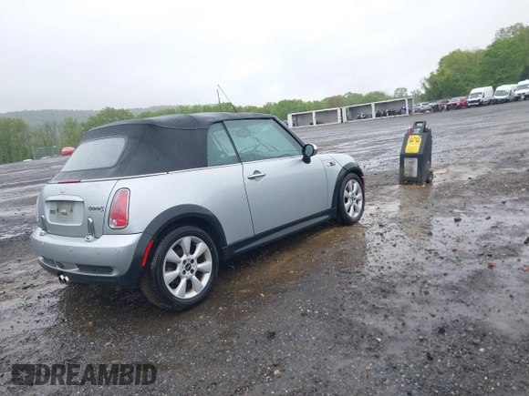 2006 MINI Convertible S with VIN WMWRH33586TF88407, listed as a IAAI auction lot 42223156 with 199,948 mi miles and . Bid and sale history available at DreamBid. Image 4.