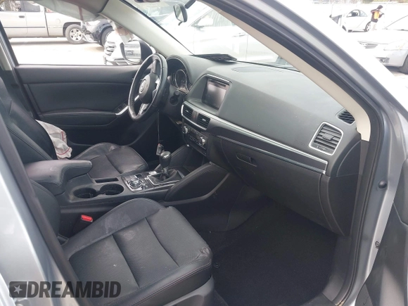 2016 Mazda CX-5 Grand Touring with VIN JM3KE2DY9G0723921, listed as a IAAI auction lot 41681522 with 83,893 mi miles. Bid and sale history available at carsss.com. Image 5.