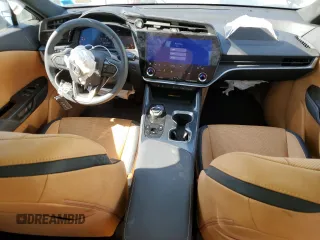 2023 Lexus RZ 450e Premium z VIN JTJAAAAB9PA013516, wystawiony jako Copart lot #50808725 z przebiegiem 571 mil mil oraz Szkoda całkowita • Salvage title. Historia ofert i sprzedaży dostępna na DreamBid. Obrazek 8.