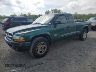 2003 Dodge Dakota z VIN 1D7HL12X73S228781, wystawiony jako Copart lot #56097405 z przebiegiem 130 922 mil mil oraz Czysty tytuł • Clean title. Historia ofert i sprzedaży dostępna na DreamBid. Obrazek 1.
