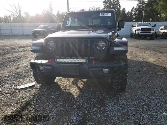 2021 Jeep Gladiator Rubicon with VIN 1C6JJTBG5ML500423, listed as a Copart auction lot 46954765 with 82,483 mi miles and Salvage title. Bid and sale history available at DreamBid. Image 11.