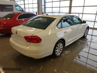 2012 Volkswagen Passat S w/Appearance with VIN 1VWAH7A35CC107902, listed as a IAAI auction lot 41243434 with 158,889 mi miles. Bid and sale history available at carsss.com. Image 4.