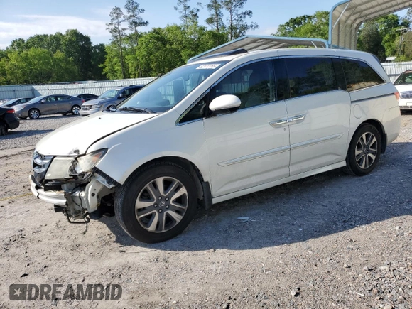 2016 Honda Odyssey Touring Elite with VIN 5FNRL5H97GB129217, listed as a Copart auction lot 52177765 with 138,045 mi miles and Salvage Title. Bid and sale history available at DreamBid. Image 1.