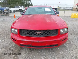 2007 Ford Mustang Deluxe z VIN 1ZVFT80N475246636, wystawiony jako IAAI lot #41620976 z przebiegiem 310 653 mil mil oraz . Historia ofert i sprzedaży dostępna na DreamBid. Obrazek 6.