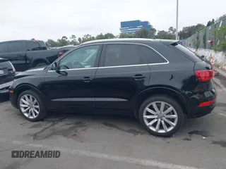 2015 Audi Q3 Premium Plus with VIN WA1EFCFS8FR002771, listed as a IAAI auction lot 42408746 with 115,564 mi miles and . Bid and sale history available at DreamBid. Image 14.