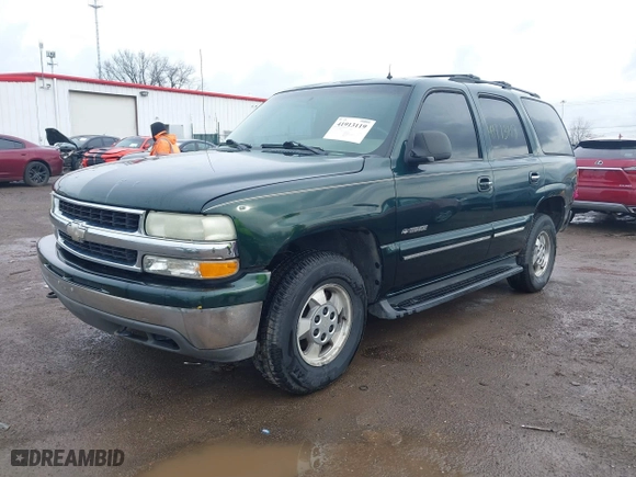 2002 Chevrolet Tahoe LT with VIN 1GNEK13Z22J154097, listed as a IAAI auction lot 41913119 with 243,978 mi miles. Bid and sale history available at carsss.com. Image 2.