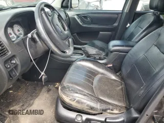 2005 Ford Escape Limited with VIN 1FMYU04115KA63383, listed as a Copart auction lot 59706164 with 212,167 mi miles and Salvage Title. Bid and sale history available at carsss.com. Image 7.
