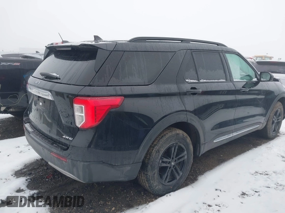 2021 Ford Explorer XLT with VIN 1FMSK8DH0MGA59737, listed as a IAAI auction lot 41474554 with 74,536 mi miles. Bid and sale history available at carsss.com. Image 4.