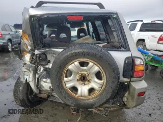 2000 Toyota RAV4 with VIN JT3HP10V7Y7169097, listed as a Copart auction lot 43357225 with 295,509 mi miles and Salvage title. Bid and sale history available at DreamBid. Image 6.