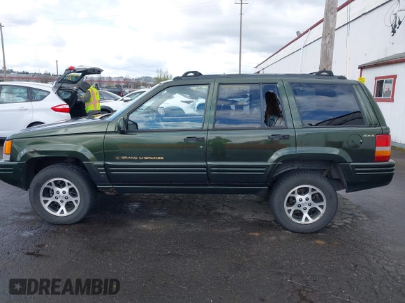 1996 Jeep Grand Cherokee Limited with VIN 1J4GZ78S0TC235692, listed as a IAAI auction lot 41945617 with Not provided miles and . Bid and sale history available at DreamBid. Image 14.
