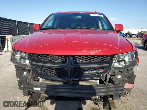 2017 Dodge Journey Crossroad Plus z VIN 3C4PDCGG6HT571997, wystawiony jako Copart lot #56372045 z przebiegiem 128 415 mil mil oraz Szkoda całkowita • Salvage title. Historia ofert i sprzedaży dostępna na DreamBid. Obrazek 5.