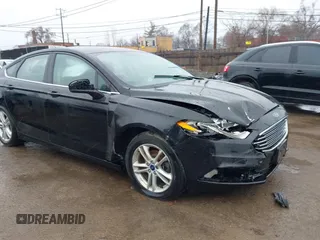 2018 Ford Fusion SE z VIN 3FA6P0H75JR113960, wystawiony jako IAAI lot #41941439 z przebiegiem 94 670 mil mil oraz . Historia ofert i sprzedaży dostępna na DreamBid. Obrazek 1.