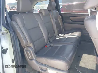 2015 Honda Odyssey Touring Elite with VIN 5FNRL5H91FB038099, listed as a IAAI auction lot 41829649 with 167,017 mi miles and . Bid and sale history available at DreamBid. Image 8.