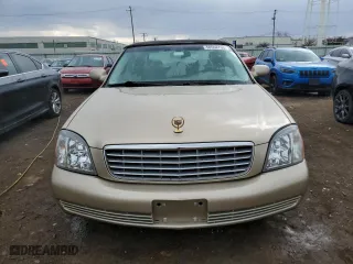 2005 Cadillac DeVille with VIN 1G6KD57Y35U242340, listed as a Copart auction lot 50558795 with 76,856 mi miles and Salvage Title. Bid and sale history available at carsss.com. Image 5.