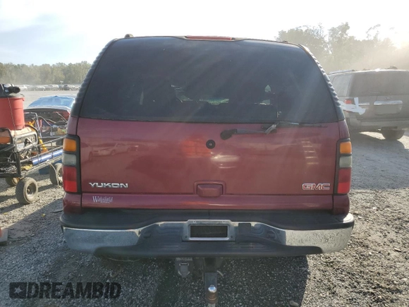 2004 GMC Yukon SLE z VIN 1GKEC13Z04J275904, wystawiony jako Copart lot #73719294 z przebiegiem 138 352 mil mil oraz Nie do naprawy • Non repairable. Historia ofert i sprzedaży dostępna na DreamBid. Obrazek 6.