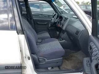 1999 Toyota RAV4 with VIN JT3GP10V2X0037397, listed as a IAAI auction lot 42603598 with 136,207 mi miles and . Bid and sale history available at DreamBid. Image 5.