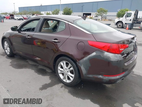 2013 Kia Optima LX z VIN 5XXGM4A72DG208410, wystawiony jako IAAI lot #42078867 z przebiegiem 89 033 mil mil oraz . Historia ofert i sprzedaży dostępna na DreamBid. Obrazek 3.