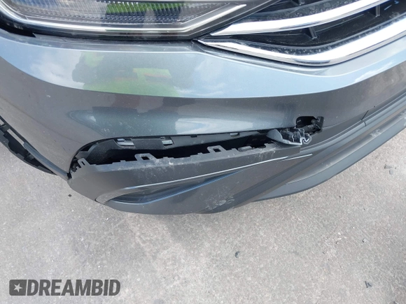 2023 Volkswagen Tiguan SE z VIN 3VVNB7AX5PM064693, wystawiony jako IAAI lot #42033011 z przebiegiem 38 220 mil mil oraz . Historia ofert i sprzedaży dostępna na DreamBid. Obrazek 6.