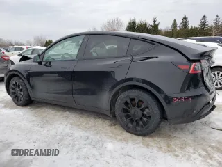 2021 Tesla Model Y Long Range z VIN 5YJYGDEE6MF089008, wystawiony jako Copart lot #45304715 z przebiegiem 140 761 mil mil oraz Szkoda całkowita • Salvage title. Historia ofert i sprzedaży dostępna na DreamBid. Obrazek 2.