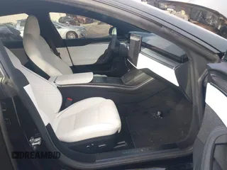 2022 Tesla Model S Plaid with VIN 5YJSA1E6XNF460235, listed as a IAAI auction lot 40951359 with 18,922 mi miles and . Bid and sale history available at DreamBid. Image 5.