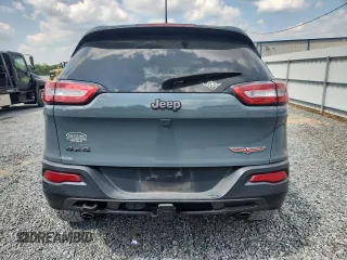 2014 Jeep Cherokee Trailhawk с VIN 1C4PJMBS1EW212024, выставлен на аукционе Copart как лот 58825265 с пробегом 99 087 миль миль и Списание • Salvage title. История ставок и продаж доступна на DreamBid. Изображение 6.