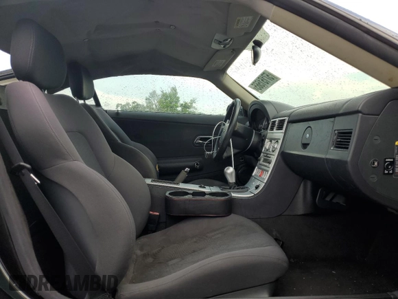 2005 Chrysler Crossfire z VIN 1C3AN59L45X032968, wystawiony jako Copart lot #57151565 z przebiegiem 157 616 mil mil oraz Tytuł czysty. Historia ofert i sprzedaży dostępna na DreamBid. Obrazek 10.