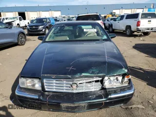 1995 Cadillac Eldorado z VIN 1G6EL12Y1SU623065, wystawiony jako Copart lot #78058414 z przebiegiem 115 060 mil mil oraz Czysty tytuł • Clean title. Historia ofert i sprzedaży dostępna na DreamBid. Obrazek 5.
