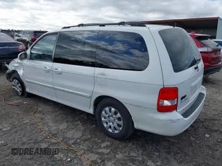 2005 Kia Sedona LX with VIN KNDUP132356708456, listed as a IAAI auction lot 41220936 with 172,960 mi miles. Bid and sale history available at carsss.com. Image 3.