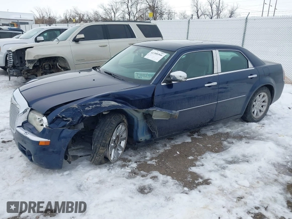 2006 Chrysler 300 C with VIN 2C3LA63H96H289693, listed as a IAAI auction lot 41308366 with 128,814 mi miles. Bid and sale history available at carsss.com. Image 2.