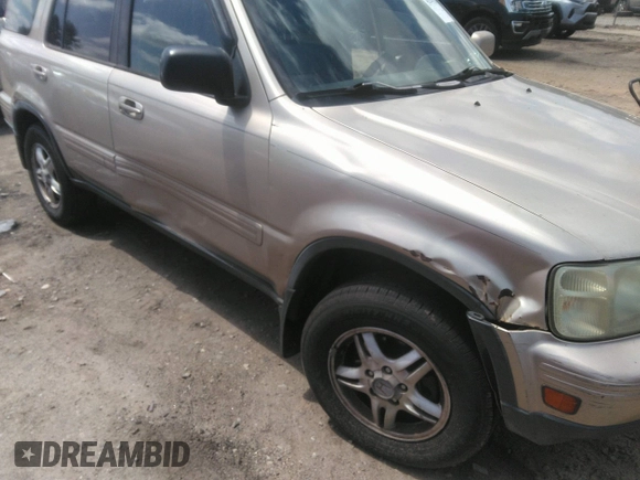 2001 Honda CR-V SE z VIN JHLRD18711C007481, wystawiony jako IAAI lot #42541213 z przebiegiem 275 020 mil mil oraz . Historia ofert i sprzedaży dostępna na DreamBid. Obrazek 6.