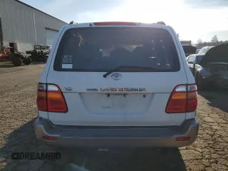 2000 Toyota Land Cruiser with VIN JT3HT05J5Y0105435, listed as a Copart auction lot 89409795 with 255,587 mi miles and Salvage Title. Bid and sale history available at carsss.com. Image 6.