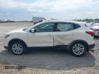 2017 Nissan Rogue SV with VIN JN1BJ1CR3HW100711, listed as a IAAI auction lot 42157090 with 106,067 mi miles and . Bid and sale history available at DreamBid. Image 14.