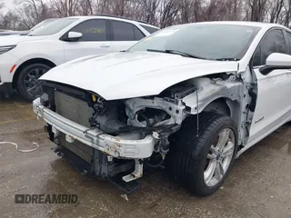 2018 Ford Fusion Hybrid SE with VIN 3FA6P0LU6JR177745, listed as a IAAI auction lot 41433376 with 97,025 mi miles. Bid and sale history available at carsss.com. Image 6.