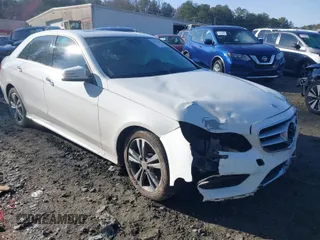 2015 Mercedes-Benz E-Class E 350 Luxury with VIN WDDHF8JB8FB125685, listed as a IAAI auction lot 41411211 with 104,063 mi miles. Bid and sale history available at carsss.com. Image 1.