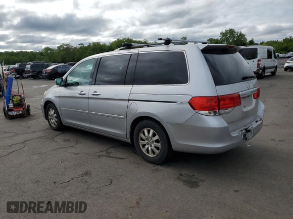 2010 Honda Odyssey EX z VIN 5FNRL3H43AB095521, wystawiony jako Copart lot #57322365 z przebiegiem 208 226 mil mil oraz Szkoda całkowita • Salvage title. Historia ofert i sprzedaży dostępna na DreamBid. Obrazek 2.
