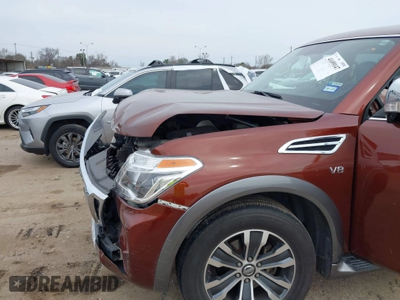 2018 Nissan Armada SL with VIN JN8AY2ND2J9051196, listed as a IAAI auction lot 41689147 with 184,547 mi miles and . Bid and sale history available at DreamBid. Image 6.