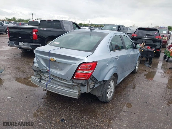 2017 Chevrolet Sonic LT with VIN 1G1JD5SBXH4164616, listed as a IAAI auction lot 41893250 with 52,033 mi miles. Bid and sale history available at carsss.com. Image 4.