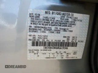 2008 Mercury Sable Premier z VIN 1MEHM43W68G619346, wystawiony jako Copart lot #60102945 z przebiegiem 167 305 mil mil oraz Szkoda całkowita • Salvage title. Historia ofert i sprzedaży dostępna na DreamBid. Obrazek 12.