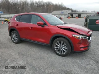 2021 Mazda CX-5 Grand Touring Reserve with VIN JM3KFBAY3M0315640, listed as a Copart auction lot 51004955 with 21,981 mi miles and Salvage Title. Bid and sale history available at DreamBid. Image 4.