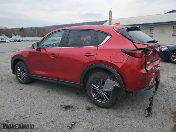 2021 Mazda CX-5 Touring with VIN JM3KFBCMXM1451736, listed as a Copart auction lot 51019245 with 9,789 mi miles and Salvage Title. Bid and sale history available at carsss.com. Image 2.