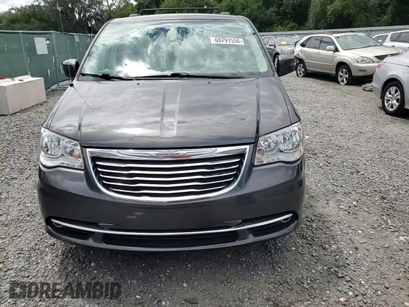 2016 Chrysler Town & Country Touring with VIN 2C4RC1BG2GR247759, listed as a Copart auction lot 68791534 with 121,758 mi miles and Salvage Title. Bid and sale history available at DreamBid. Image 11.