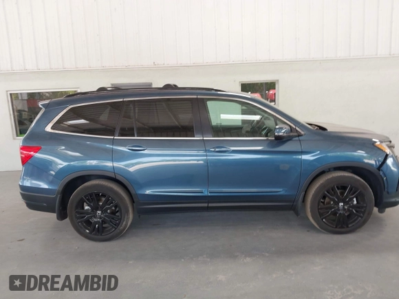 2021 Honda Pilot Special Edition with VIN 5FNYF5H27MB011413, listed as a IAAI auction lot 42082680 with 27,474 mi miles and . Bid and sale history available at carsss.com. Image 13.