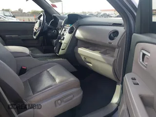 2012 Honda Pilot EX-L with VIN 5FNYF3H51CB036501, listed as a IAAI auction lot 41703208 with 223,984 mi miles. Bid and sale history available at carsss.com. Image 5.