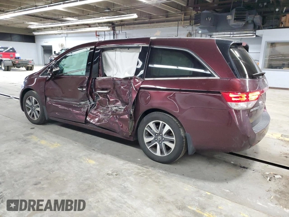 2014 Honda Odyssey Touring with VIN 5FNRL5H93EB079817, listed as a Copart auction lot 56231645 with 65,521 mi miles and Salvage title. Bid and sale history available at DreamBid. Image 2.