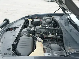 2020 Dodge Charger Police z VIN 2C3CDXKT3LH127511, wystawiony jako IAAI lot #42779533 z przebiegiem 134 886 mil mil oraz . Historia ofert i sprzedaży dostępna na DreamBid. Obrazek 20.