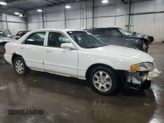 2001 Mazda 626 LX with VIN 1YVGF22C515228204, listed as a Copart auction lot 44416185 with 127,230 mi miles and Salvage Title. Bid and sale history available at carsss.com. Image 4.