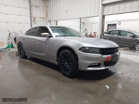2016 Dodge Charger SXT with VIN 2C3CDXJG9GH180966, listed as a IAAI auction lot 41243491 with 127,235 mi miles. Bid and sale history available at carsss.com. Image 1.