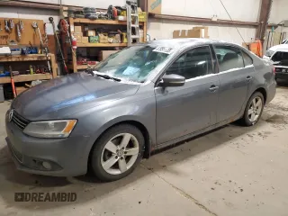2011 Volkswagen Jetta Comfortline with VIN 3VWDL7AJ2BM025004, listed as a Copart auction lot 87851135 with 289,549 mi miles and Salvage title. Bid and sale history available at DreamBid. Image 1.